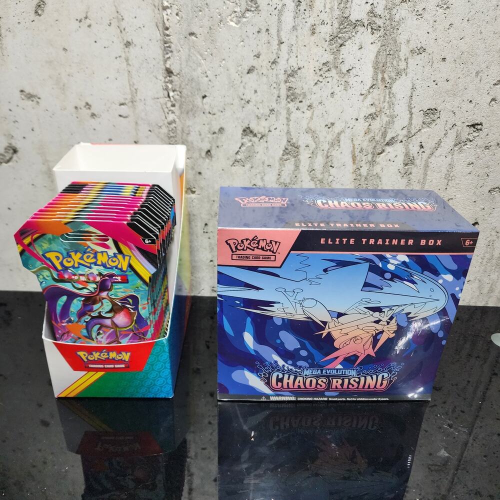 Pokemon TCG Chaos Rising ETB and 14x Sleeved Packs.